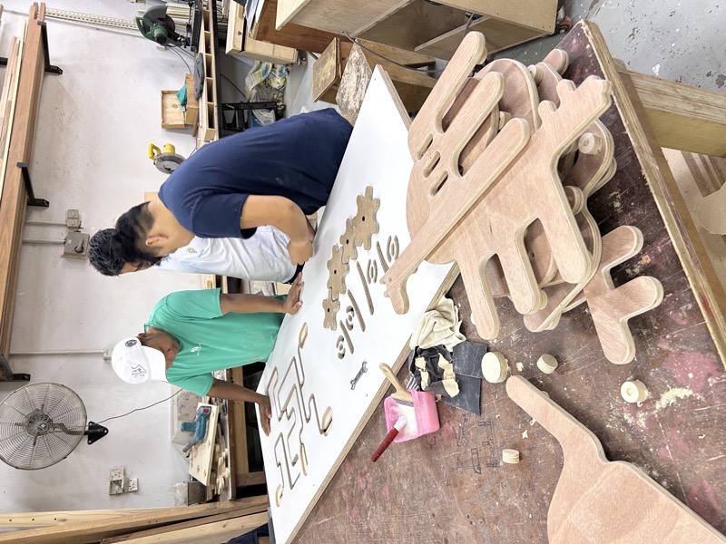 CNC workshop crafting wooden playground pieces